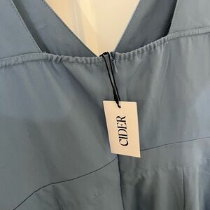 Periwinkle blue romper from Cider, never worn after trying on. Tags still on!